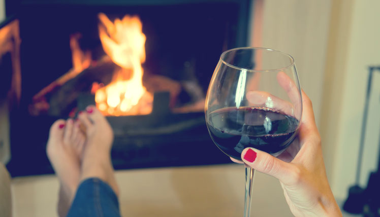 Screw it! wine glass by the Fireplace