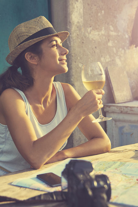 Woman with hat and Screw it! wine glass